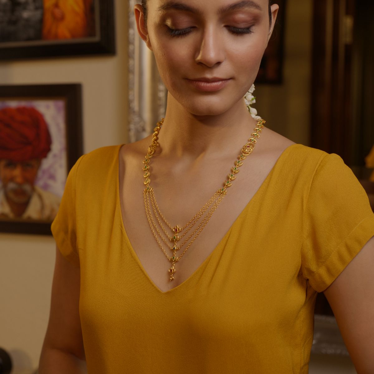 Rajwada Glory layered necklace worn with a marigold blouse